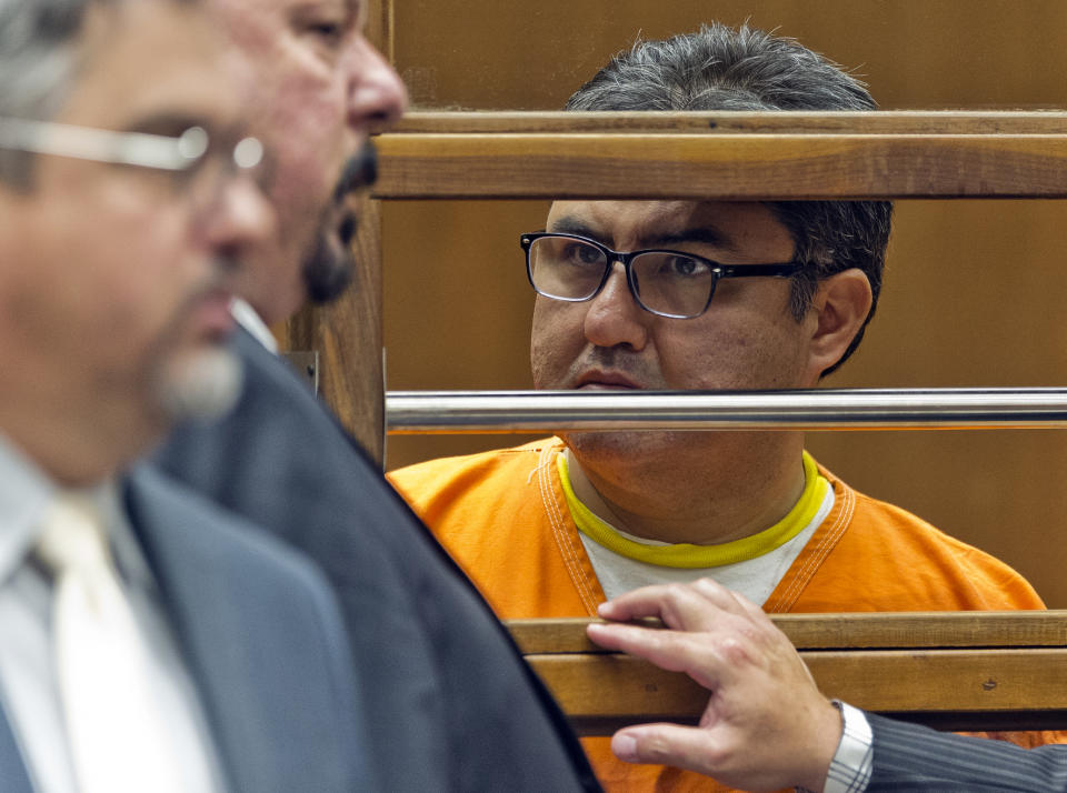 Naason Joaquin Garcia, the leader of Mexican megachurch La Luz del Mundo, listens to a court interpreter as he appears in Los Angeles County Superior Court on Friday, June 21, 2019. García and his co-defendants were arrested earlier this month on suspicion of child rape, statutory rape, molestation, human trafficking, child pornography and extortion. The charges in the 26-count felony complaint detail allegations involving three girls and one woman between 2015 and 2018 in Los Angeles County. (AP Photo/Damian Dovarganes)