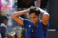 Chile's Alejandro Tabilo celebrates after winning a match against Serbia's Novak Djokovic at the Italian Open tennis tournament in Rome, Sunday, May 12, 2024. (AP Photo/Alessandra Tarantino)