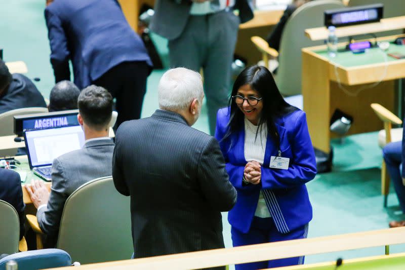 FILE PHOTO: Venezuela's Vice President Rodriguez speaks with Iran's Foreign Minister Zarif as they attend the 74th session of the United Nations General Assembly at U.N. headquarters in New York City, New York, U.S.