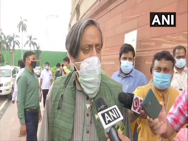 Congress MP Shashi Tharoor speaking to reporters at Parliament in Delhi on Thursday. [Photo/ANI]