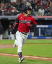 Cleveland Indians' Andres Gimenez heads to first base after hitting a solo home run off Chicago White Sox starting pitcher Lance Lynn during the third inning of a baseball game in Cleveland, Saturday, Sept. 25, 2021. (AP Photo/Phil Long)