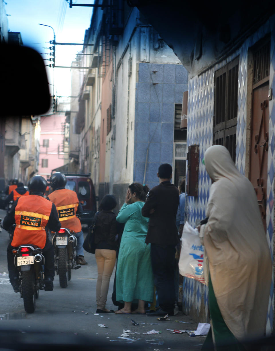 This Saturday April 26, 2014 photo shows Moroccan police officers patrolling in a street of Casablanca, Morocco. As home to most of Morocco’s economy, as well as most its slums, Casablanca in particular has always had a crime problem. It is a city of extremes, with skyscrapers and highend nightlife on one hand and the other the crushing poverty that spawned the angry youth who killed 33 people in a spate of bombings in 2003.(AP Photo / Abdeljalil Bounhar)