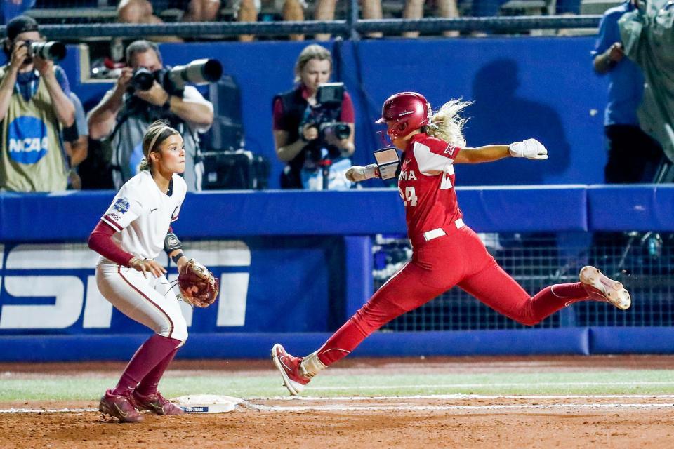 Oklahoma outfielder Jayda Coleman (24) runs through first in the sixth inning during the first game of the Women's College World Series finals between Oklahoma (OU) and Florida State at USA Softball Hall of Fame Stadium in Oklahoma City on Wednesday, June 7, 2023.