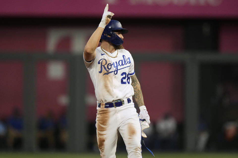 Kansas City Royals' Kyle Isbel celebrates on second after hitting an RBI double during the fifth inning of a baseball game against the Detroit Tigers Wednesday, July 19, 2023, in Kansas City, Mo. (AP Photo/Charlie Riedel)