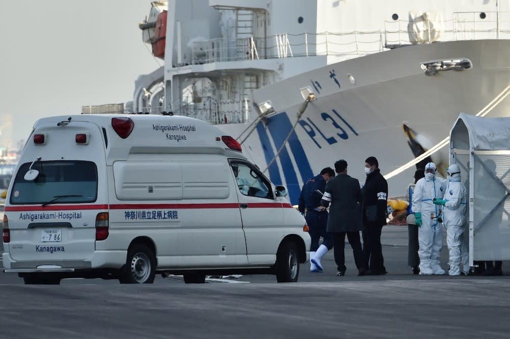 Personnel clad in protective gear and tasked to provide care for suspected patients on board the Diamond Princess cruise ship prepare to conduct a transfer at the Daikoku Pier Cruise Terminal in Yokohama on February 7, 2020. — Reuters pic