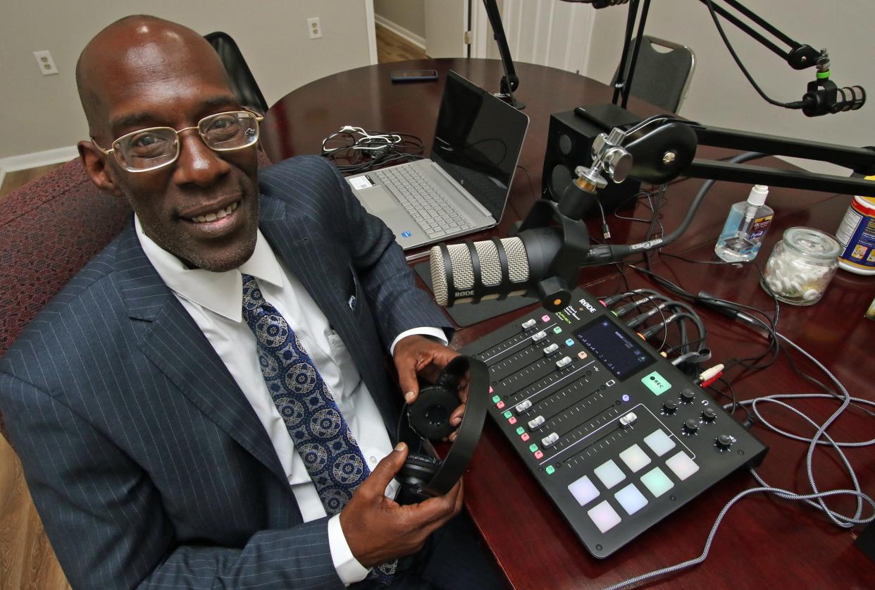 Jimmy Hall poses after recording an interview with local members of the community during his “We Promote Community Success” podcast Tuesday morning, Feb. 28, 2023, at his studio in Shelby.