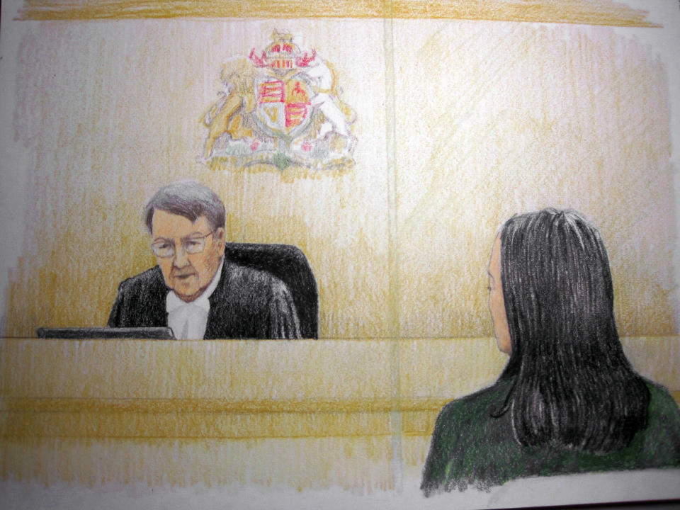 In this courtroom sketch, Meng Wanzhou, right, the chief financial officer of Huawei Technologies, listens to the judge during a bail hearing at B.C. Supreme Court in Vancouver, British Columbia, on Tuesday, Dec. 11, 2018. Wanzhou has been granted bail for $10 million by a B.C. Supreme Court judge, $7.5 million of which must be cash. Wanzhou is wanted by the United States on allegations that the company violated trade sanctions against Iran. (Jane Wolsak/The Canadian Press via AP)