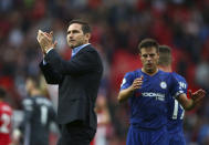 Chelsea's head coach Frank Lampard, left, and Chelsea's Cesar Azpilicueta acknowledge spectators after the English Premier League soccer match between Manchester United and Chelsea at Old Trafford in Manchester, England, Sunday, Aug. 11, 2019. (AP Photo/Dave Thompson)