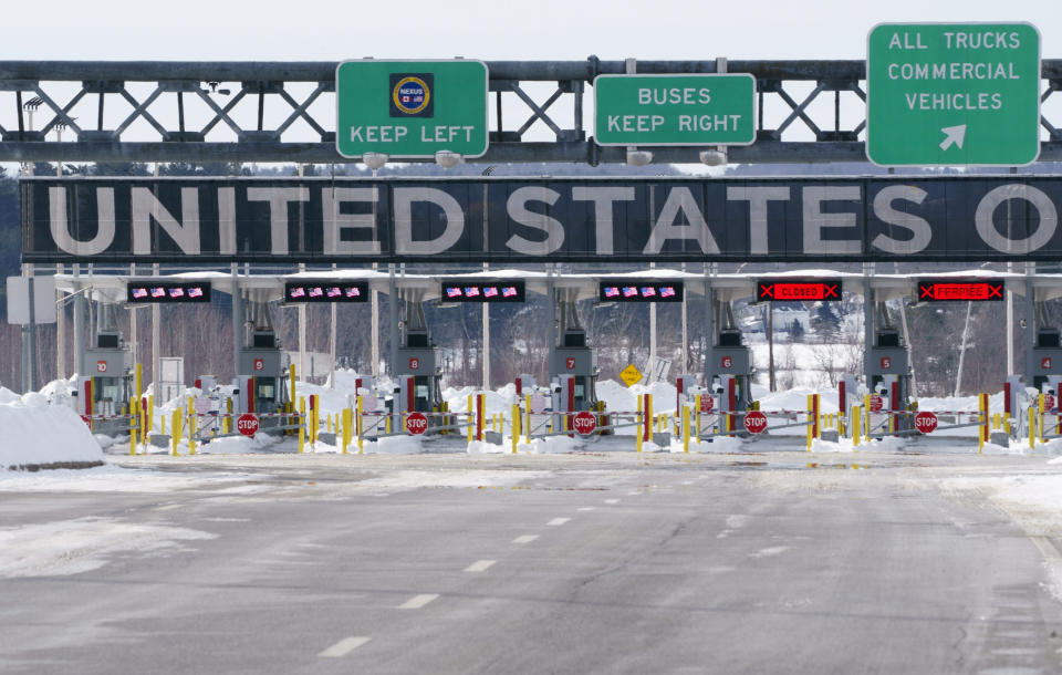 The border crossing into the United States is seen during the COVID-19 pandemic in Lacolle, Quebec, on Friday, Feb. 12, 2021. Tighter border controls will come into effect Feb. 22, the prime minister said Friday, not to punish travelers but to try to keep everyone safe. (Paul Chiasson/The Canadian Press via AP)