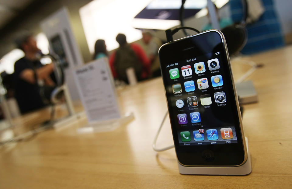 NEW YORK - JULY 11:  The new Apple iPhone 3G is on display at the Apple Store, Fifth Avenue, in midtown Manhattan July 11, 2008 in New York City. Crowds of gadget lovers worldwide are purchasing the device following aggressive promotions. (Photo by Mario Tama/Getty Images)