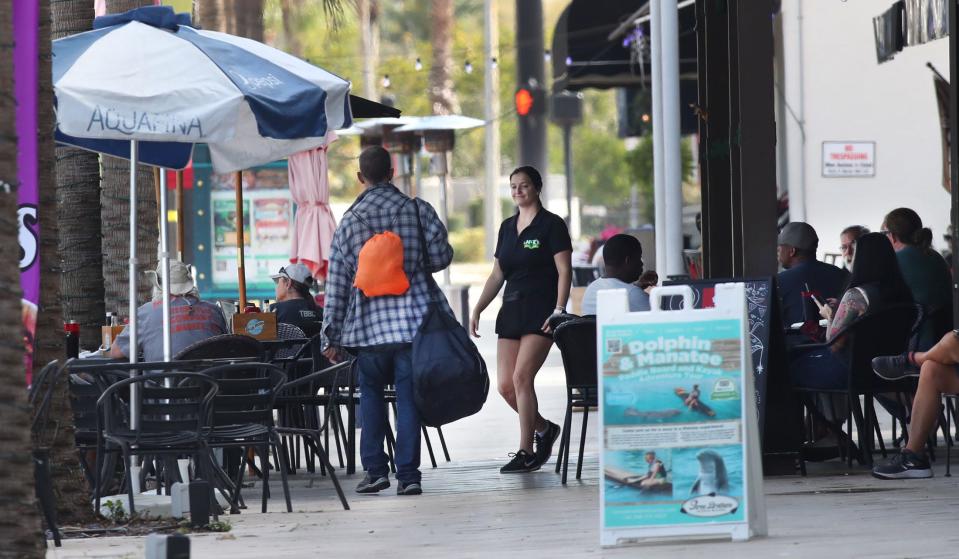 Problems with the homeless and panhandlers hanging around Daytona's Beach Street have spiked since last summer. City officials are going to try stationing security guards on the road.