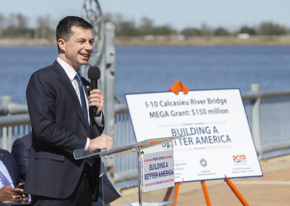 United States Secretary of Transportation Pete Buttigieg speaks during a press conference on the seawall at the Civic Center in Lake Charles, La., Thursday, Feb. 9, 2023. Buttigieg's visit on Thursday is to celebrate a $150 million grant to help replace the outdated Interstate 10 Calcasieu River Bridge. The project is among the first major grant recipients under President Joe Biden's $1 trillion infrastructure deal. (Rick Hickman/American Press via AP)