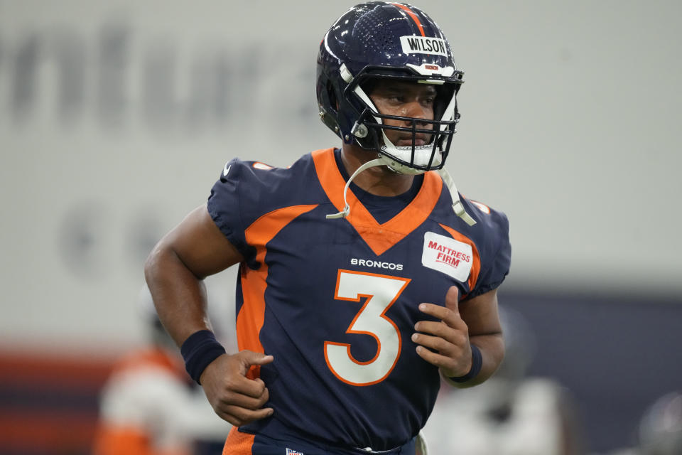 Russell Wilson and other Broncos starters will see action in the preseason. (AP Photo/David Zalubowski)