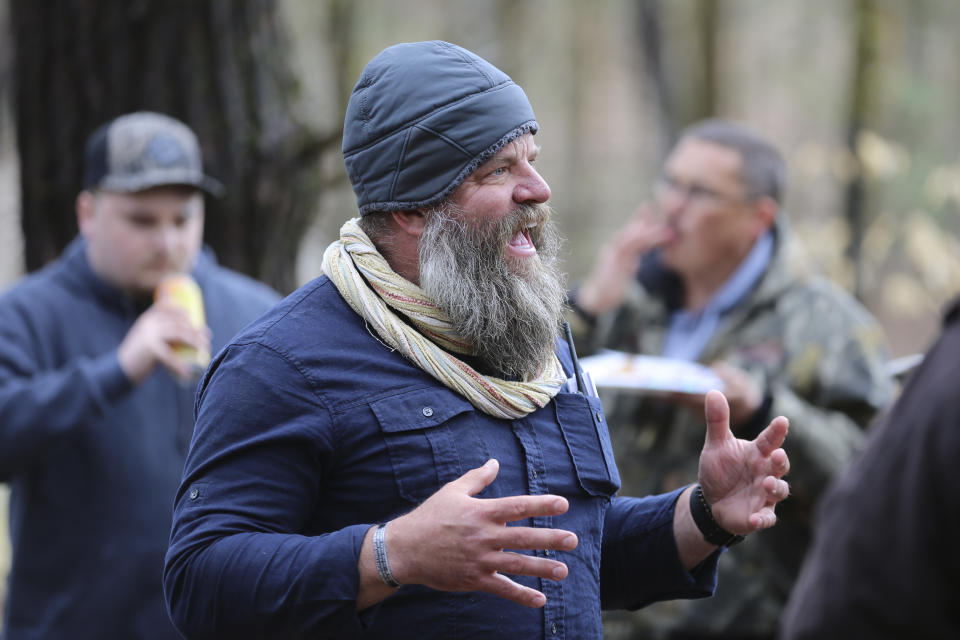 Daniel Banyai, the owner of Slate Ridge Vermont, speaks to supporters on April 17, 2021 in West Pawlet, Vt., during a Second Amendment Day Picnic at the unpermitted gun range and firearms training center. Banyai has until summer to remove all unpermitted structures at a gun training center, which was built without zoning approval, after a ruling by the Vermont Environmental Court. The court is fining Banyai $200 a day and ruled Wednesday Feb. 9, 2023 that he would be jailed if he does not comply with orders by the end of June. (AP Photo/Wilson Ring, File)