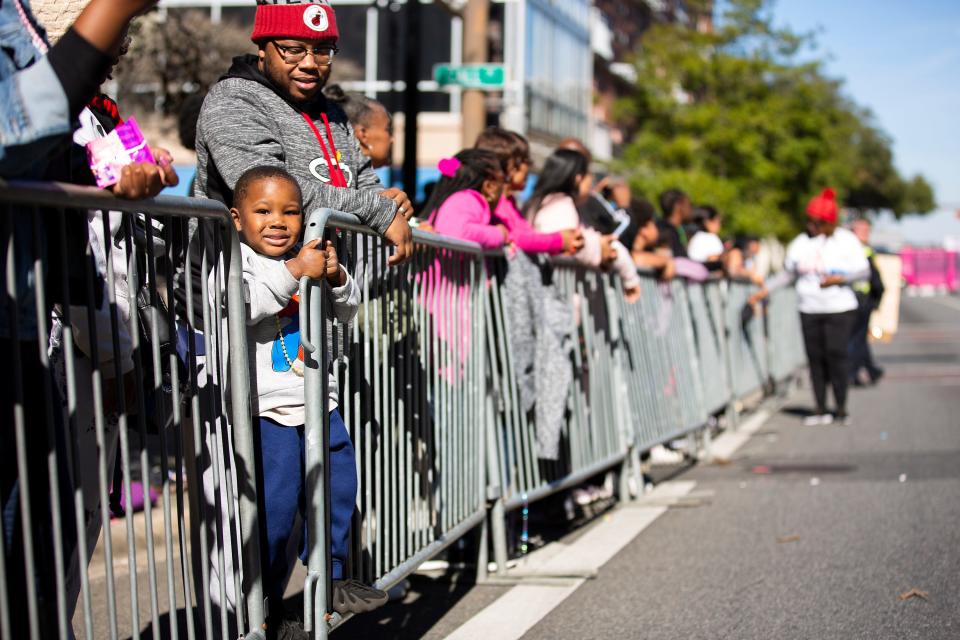 Parade goers watch local groups participate in the Martin Luther King Jr. Day parade in Tallahassee, Fla. on Monday, Jan. 16, 2023. 