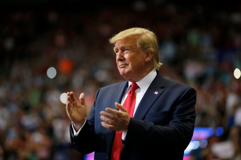 CINCINNATI, Ohio – President Donald Trump takes the stage during a campaign rally at US Bank Arena in downtown Cincinnati on Aug. 1, 2019.