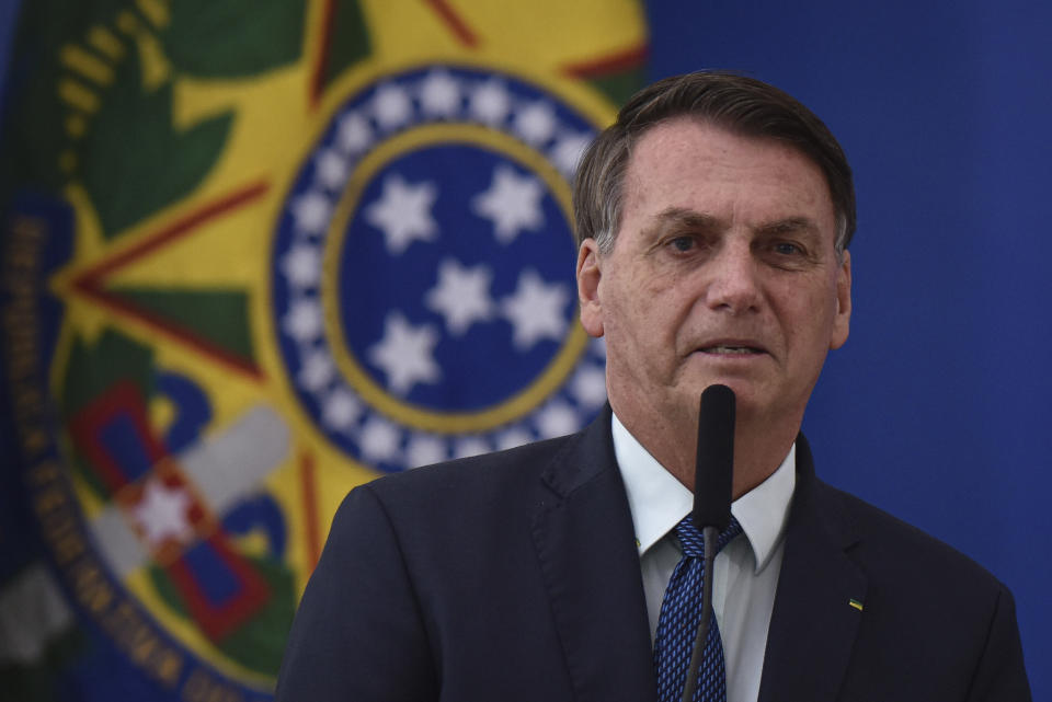 Brazilian President Jair Bolsonaro speaks during the swearing-in ceremony of his new health minister, Nelson Teich, at Planalto Palace in Brasilia on April 17, 2020.&nbsp; (Photo: AP Photo/Andre Borges)