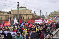 Thousands of protesters march downtown Prague, Czech Republic, Monday, Nov. 27, 2023. On Monday labor unions staged a day of protests and strikes across the Czech Republic to voice their opposition to the government's package of cuts and austerity measures meant to keep the ballooning deficit under control. (AP Photo/Petr David Josek)