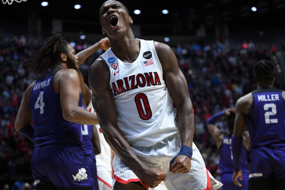 Mar 20, 2022; San Diego, CA, USA; Arizona Wildcats guard Bennedict Mathurin (0) reacts after scoring in the overtime period against the TCU Horned Frogs during the second round of the 2022 NCAA Tournament at Viejas Arena. Mandatory Credit: Orlando Ramirez-USA TODAY Sports