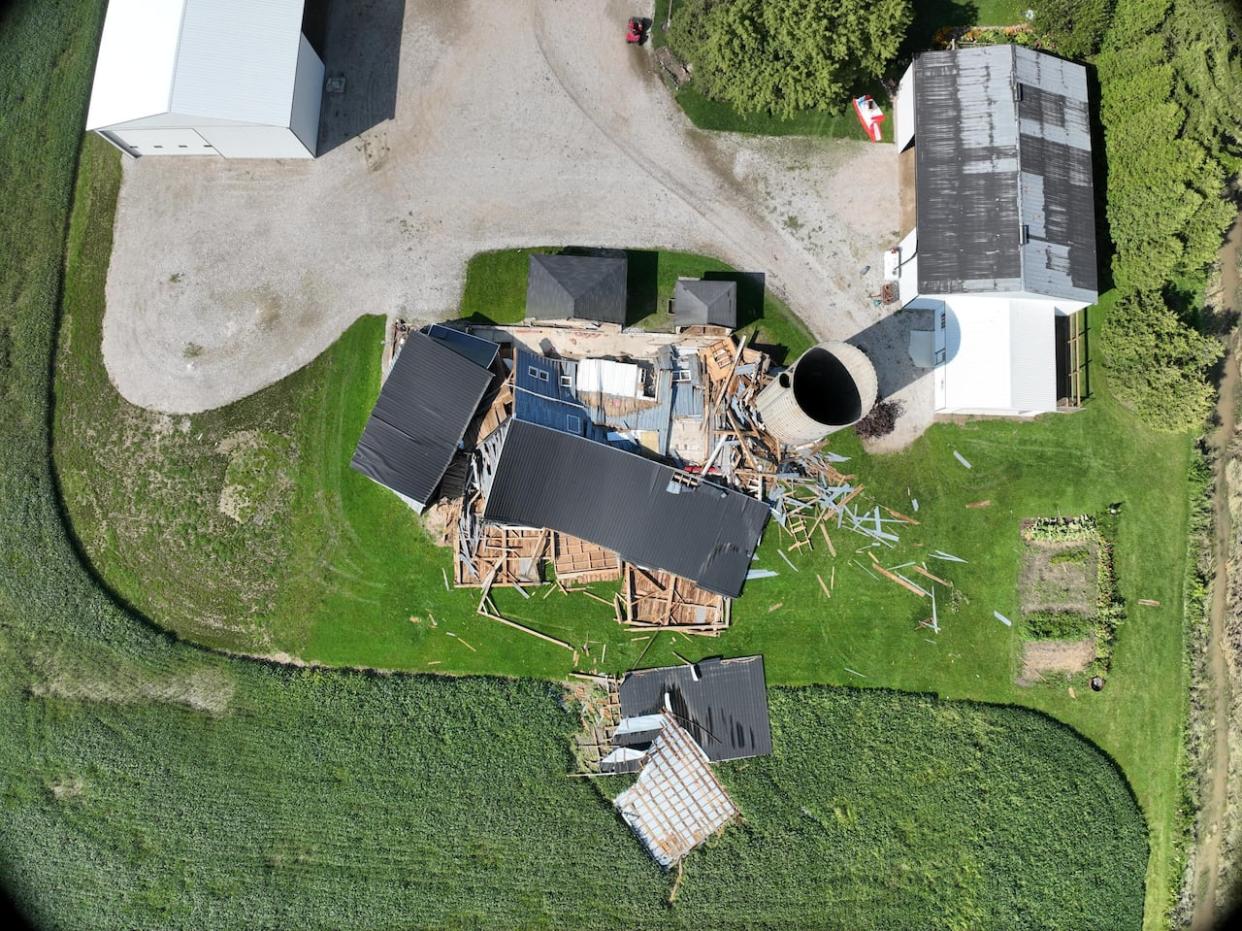 Aerial view of damage to a barn that collapsed after being hit by a tornado in Tecumseh, Ont., Aug. 24, 2023. (NTP - image credit)