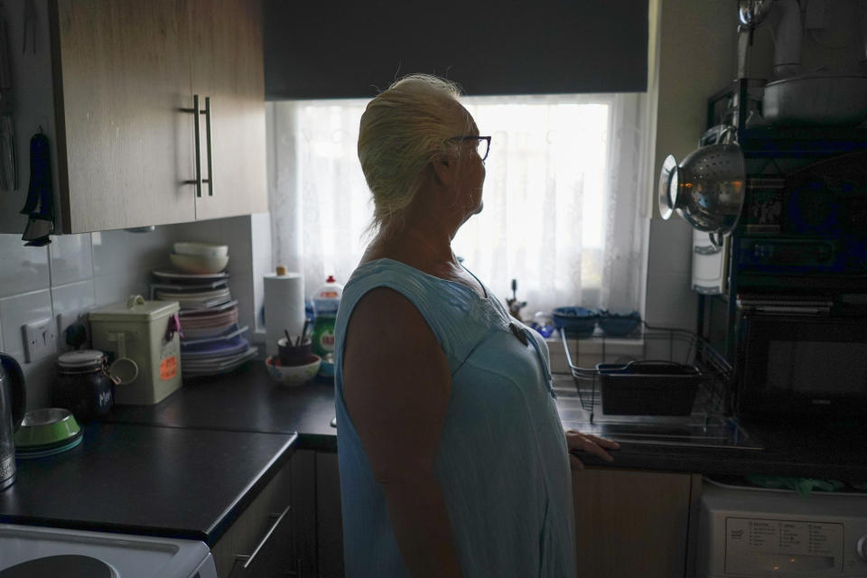 Sharron Anderson, 60, is photographed in her house in Plumstead, London, Thursday, Sept. 8, 2022. New British Prime Minister Liz Truss announced Thursday that her Conservative government will cap domestic energy prices for homes and businesses to ease a cost-of-living crisis that has left residents across the United Kingdom facing a bleak winter “I'm not optimistic at all. It's already too much of a struggle on what we're getting. I will be in debt without a doubt, there’s no way I can pay 2,500 pounds," said Sharron Anderson, 60, a former government worker in London who recently became dependent on welfare payments after suffering a heart attack. (AP Photo/Alberto Pezzali)