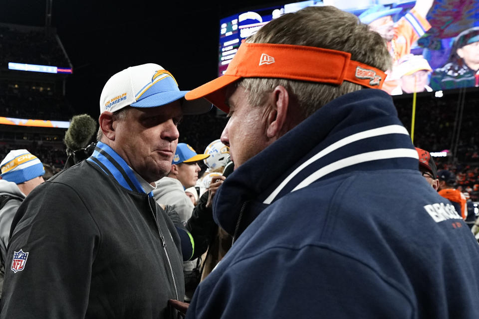 Los Angeles Chargers interim head coach Giff Smith speaks with Denver Broncos head coach Sean Payton after an NFL football game, Sunday, Dec. 31, 2023, in Denver. The Denver Broncos won 16-9. (AP Photo/Jack Dempsey)