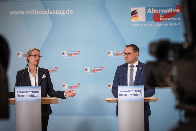 Alice Weidel, Parliamentary group leader of the Alternative for Germany (AfD) party, speaks alongside Tino Chrupalla, AfD federal chairman and parliamentary group leader, during a press statement before the start of the party's parliamentary group meeting. Michael Kappeler/dpa