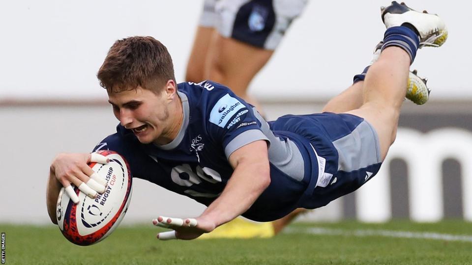 Nye Thomas of Sale Sharks goes over to score their side's sixth try during the Premiership Rugby Cup match between Sale Sharks and Bedford Blues at AJ Bell Stadium on September 09, 2023 in Salford, England.