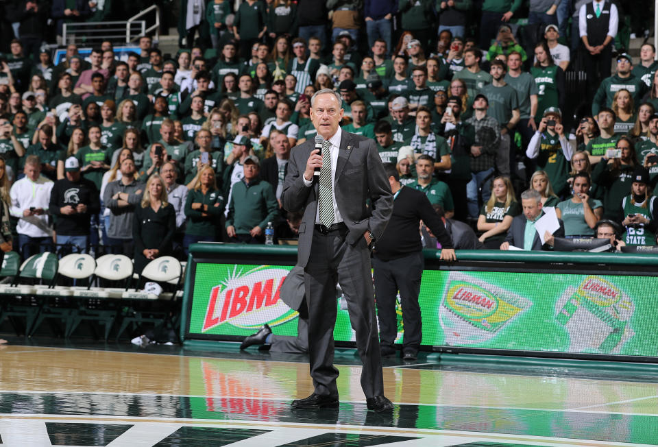 EAST LANSING, MI - FEBRUARY 04: Head coach Mark Dantonio of the Michigan State Spartans address the crowd during halftime of a college basketball game between the Michigan State Spartans and Penn State Nittany Lions at the Breslin Center on February 4, 2020 in East Lansing, Michigan. (Photo by Rey Del Rio/Getty Images)