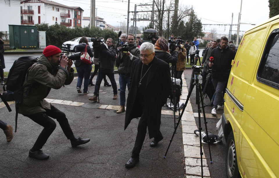 Bayonne Archbishop Marc Aillet arrives at a private Catholic school after a teacher of Spanish has been stabbed to death by a high school student, Wednesday, Feb. 22, 2023 in Saint-Jean-de-Luz, southwestern France. The student has been arrested by police, the prosecutor of Bayonne said. (AP Photo/Bob Edme)