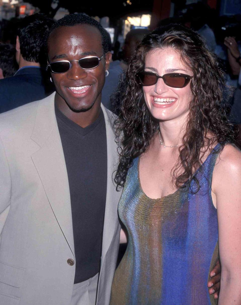 Taye Diggs and actress Idina Menzel attend the "How Stella Got Her Groove Back" Hollywood Premiere on August 3, 1998 at the Mann's Chinese Theatre in Hollywood, California