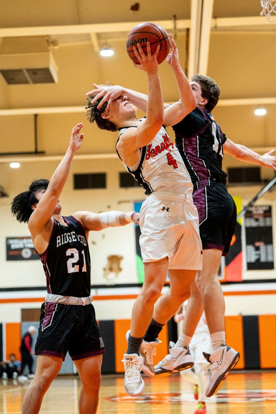 Jan 27, 2024; Tenafly, New Jersey, United States; From left, R #21 Rick Son, T #4 Yuval Gutman and R #12 Jake Roth. Tenafly plays Ridgewood in the Bergen County Jamboree boys basketball tournament at Tenafly High School on Saturday afternoon.