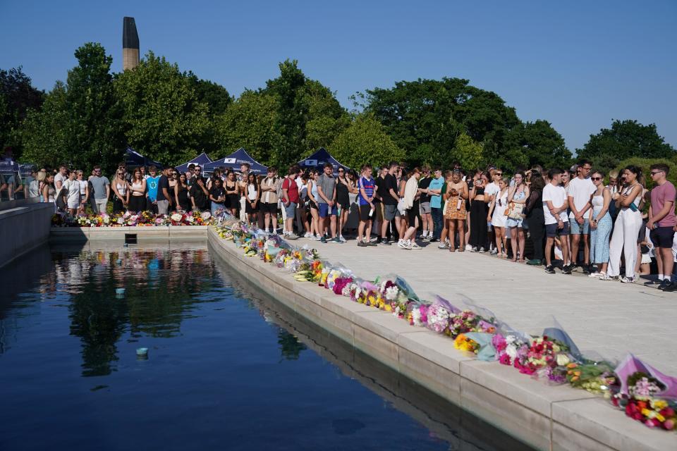 Flowers are laid in memory of students Grace O'Malley Kumar and Barnaby Webber during a vigil at the University of Nottingham after they and Ian Coates were killed and another three hurt in connected attacks on Tuesday morning. Picture date: Wednesday June 14, 2023.