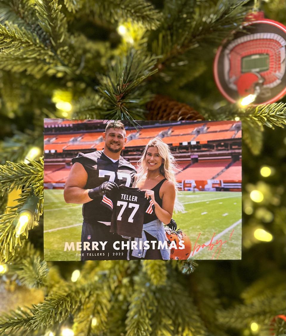 Carly and Wyatt Teller used this photograph to announce they're expecting their first child in December. The couple also used the photo to make Christmas cards that Carly mailed to about 500 Browns fans this year.