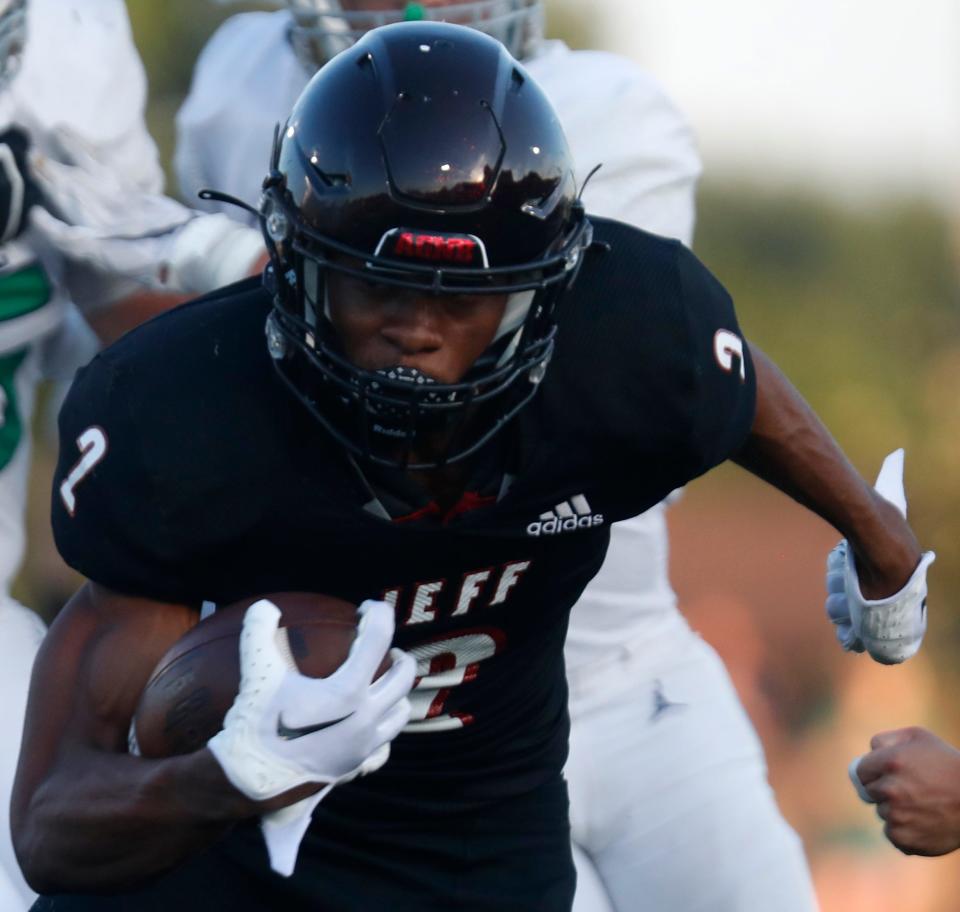 Lafayette Jefferson Bronchos Glenn Patterson (2) rushes the ball during the IHSAA football game against the Cathedral Fighting Irish, Friday, Aug. 19, 2022, at Scheumann Stadium in Lafayette, Ind. 