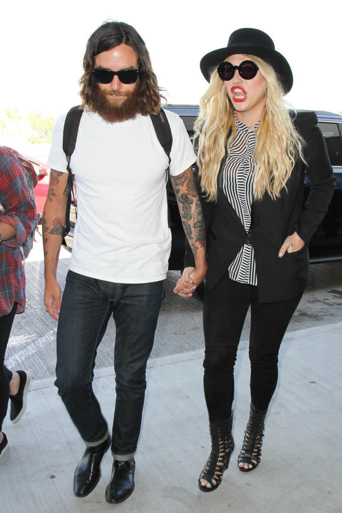 LOS ANGELES, CA - SEPTEMBER 18: Brad Ashenfelter and Kesha are seen at LAX on September 18, 2015 in Los Angeles, California.  (Photo by GVK/Bauer-Griffin/GC Images)