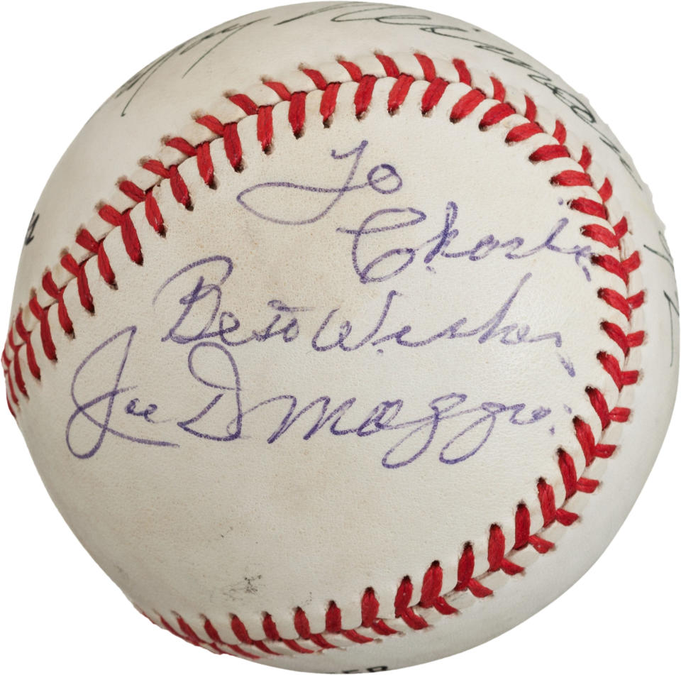 This undated photo provided by Heritage Auctions, shows a baseball signed by Joe DiMaggio, and decorated on the other side in 1992 by sports artist LeRoy Neiman with a likeness of Marilyn Monroe. What makes the baseball rare is that DiMaggio, who was briefly married to Monroe, famously refused to sign anything related to her, the auction house said. It is from the collection of bank marketing executive, which will be offered in a Heritage Auctions online sale on May 16. (AP Photo/Heritage Auctions)