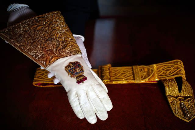 Victoria Jones-Pool/Getty The coronation glove worn by King Charles displayed at Buckingham Palace