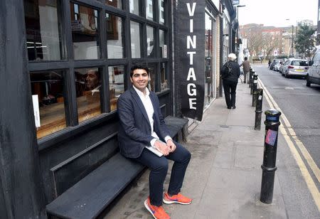 British-Iranian Ali Tehrani, a 24-year-old University College of London graduate and founder of start-up firm KeyPursuit, poses for a photograph in Brick Lane in London, Britain, in this picture taken March 22, 2016. REUTERS/Pamela Barbaglia