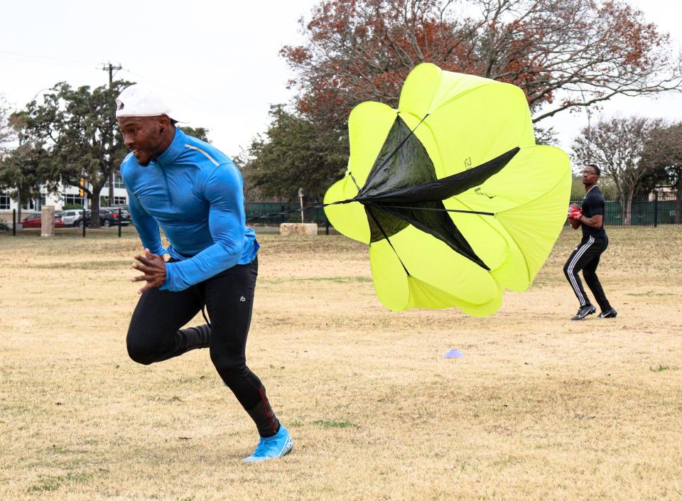 Former Freeport star Steve McShane works out near his home in San Antonio, Texas, with his brother, Deion McShane, right, shortly after signing to play pro football in Germany on Jan. 2, 2023.