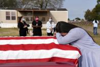 FILE PHOTO: Family and friends gather for the funeral of Gregory Blanks, who died of COVID-19