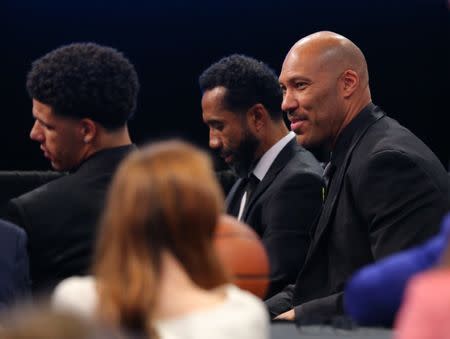 Jun 22, 2017; Brooklyn, NY, USA; Lonzo Ball (left) sits with his father LaVar Ball (right) before the first round of the 2017 NBA Draft at Barclays Center. Mandatory Credit: Brad Penner-USA TODAY Sports