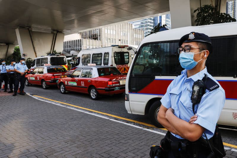 A police arrives West Kowloon Magistrates’ Courts by police van with pro-democracy activist, in Hong Kong