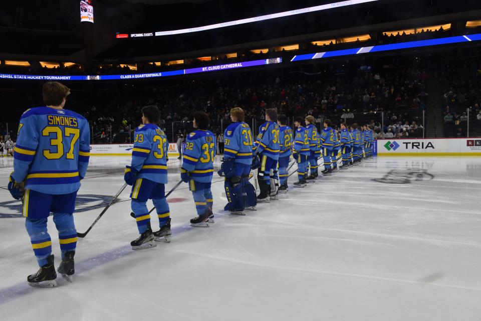 St. Cloud Cathedral players line up ahead of Wednesday's state tournament game.