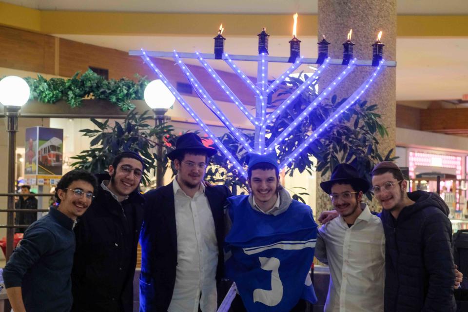 The six "Roving Rabbis" came to Westgate Mall to light a menorah and celebrate Hanukkah Thursday with the people of Amarillo.