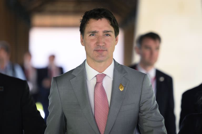 CORRECTS DAY OF WEEK - Canadian Prime Minister Justin Trudeau arrives ahead of an emergency meeting of leaders at the G20 summit in Nusa Dua, Bali, Indonesia Wednesday, Nov. 16, 2022, following a missile explosion in Poland. (Leon Neal/Pool Photo via AP)