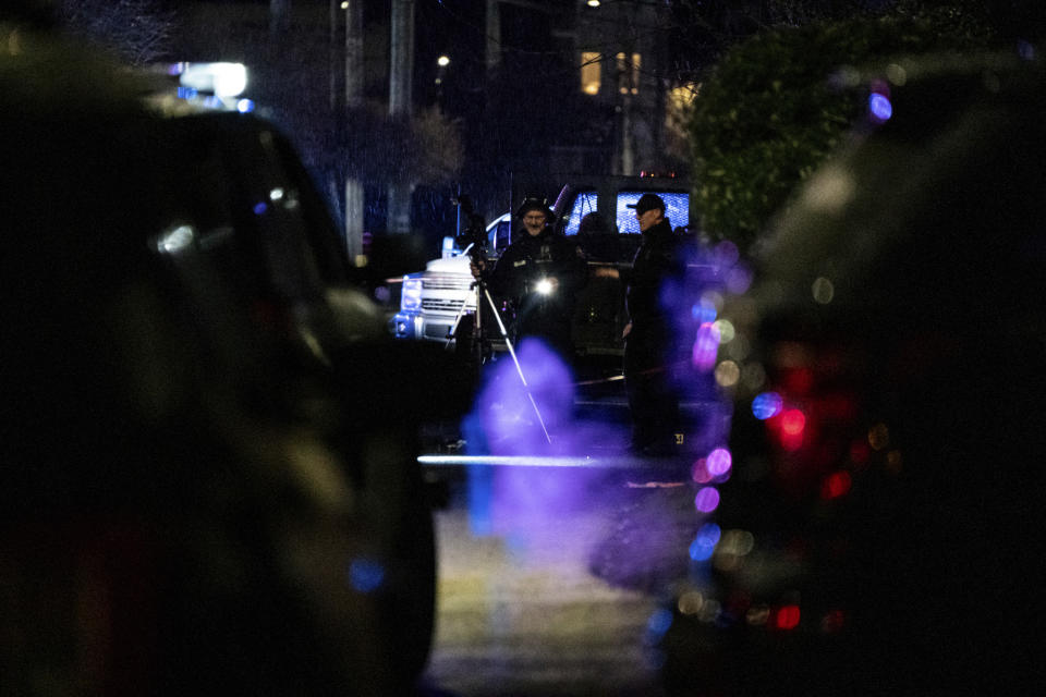 Police respond to a fatal shooting in the area of Normandale Park in Northeast Portland on Saturday evening, Feb. 19, 2022. (Mark Graves/The Oregonian via AP)