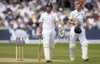 England's Ian Bell (L) leaves the field after being dismissed as teammate Joe Root looks on during their first cricket test match against India at Trent Bridge cricket ground in Nottingham, England July 11, 2014. REUTERS/Philip Brown