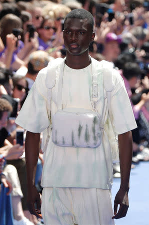 A model presents a creation by designer Virgil Abloh as part of his Spring/Summer 2019 collection for Louis Vuitton fashion house during Men's Fashion Week in Paris, France, June 21, 2018. REUTERS/Charles Platiau