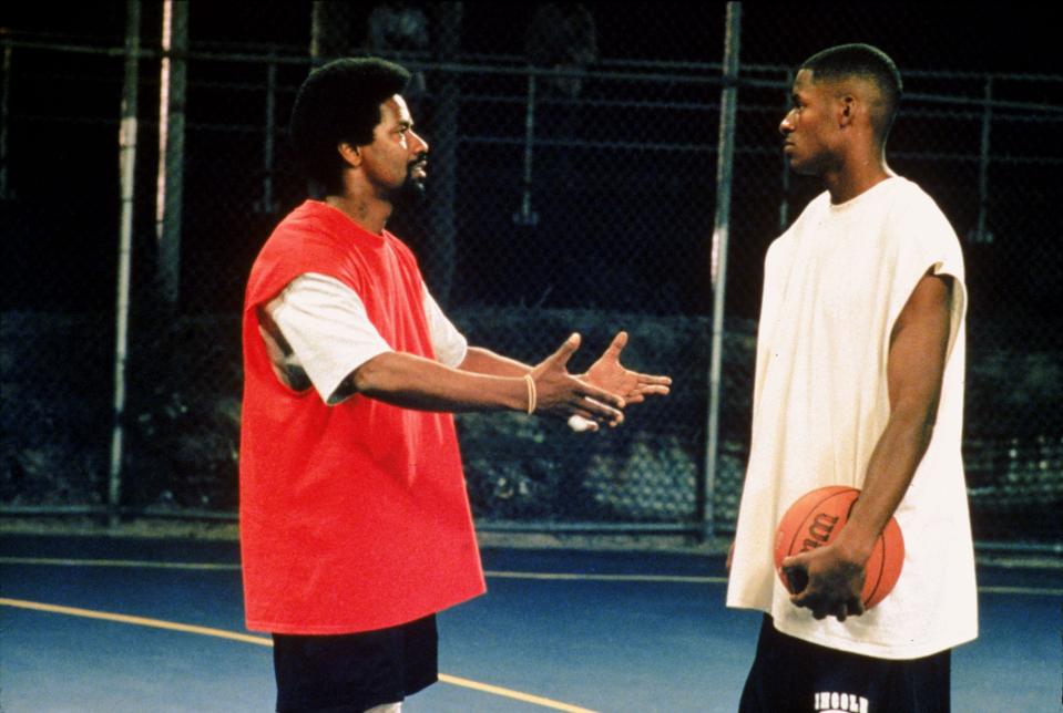 Jake Shuttlesworth (Denzel Washington, left) is a former hoops star and convicted felon trying to connect with his estranged son Jesus (Ray Allen) in Spike Lee's "He Got Game."